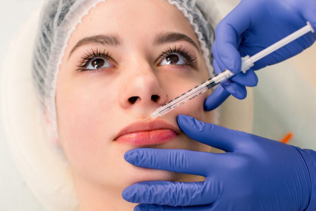 a beautiful woman receives a filler injection on t 2026 03 17 03 33 30 utc