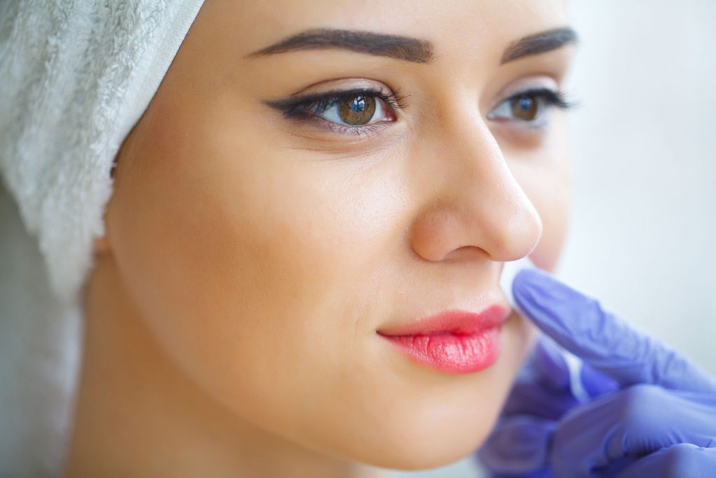 beautician waxing young woman s eyebrows in spa ce 2026 03 24 11 38 52 utc