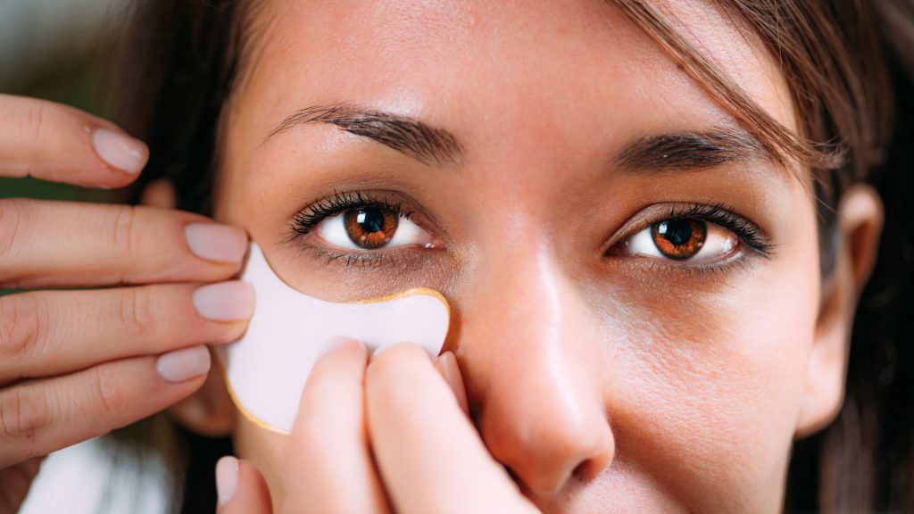 beautiful woman using undereye patches 2026 03 10 02 04 59 utc