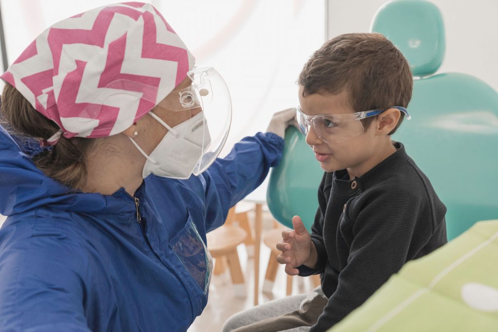 cute toddler boy sitting in front of the dentist i 2026 03 17 14 45 28 utc