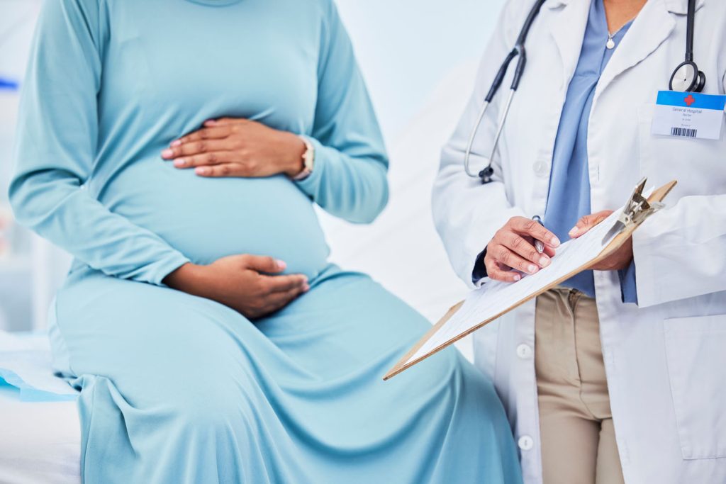 doctor woman hands and pregnancy in a hospital wi 2026 01 09 09 37 04 utc