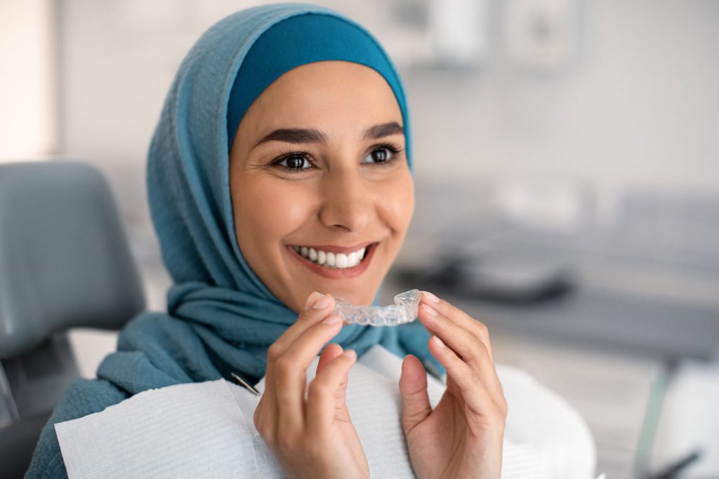 orthodontics concept smiling muslim woman in hija 2026 01 08 23 08 10 utc 1