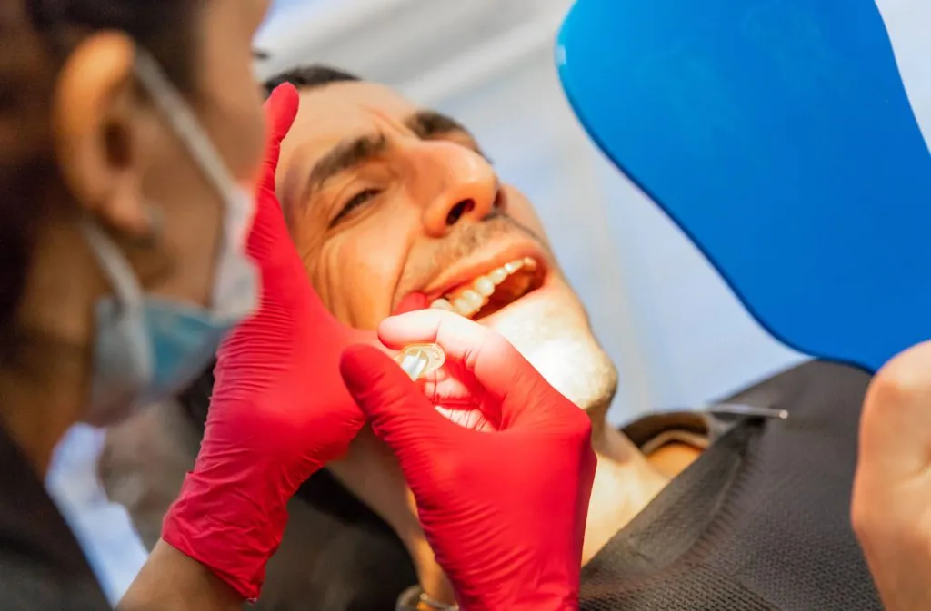 a man at a dentist appointment selective focus 2026 03 27 00 53 12 utc