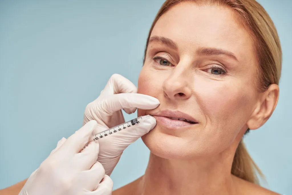 beautiful mature caucasian woman making lip augmen 2026 01 09 01 20 58 utc