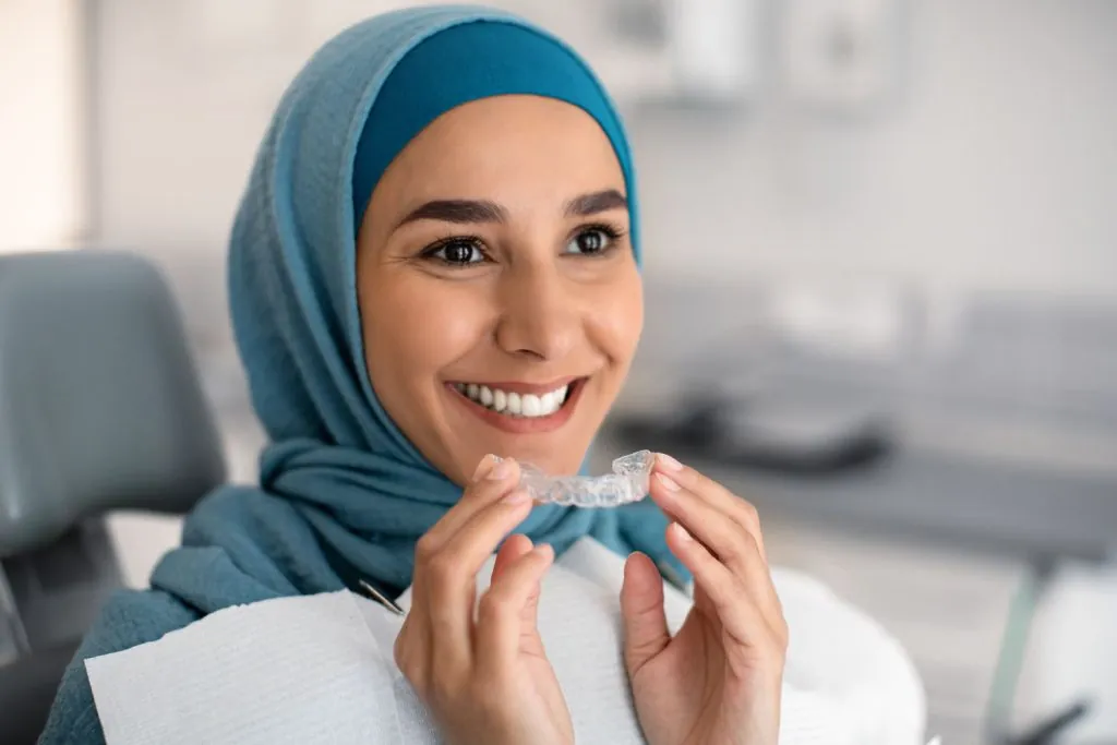 orthodontics concept smiling muslim woman in hija 2026 01 08 23 08 10 utc